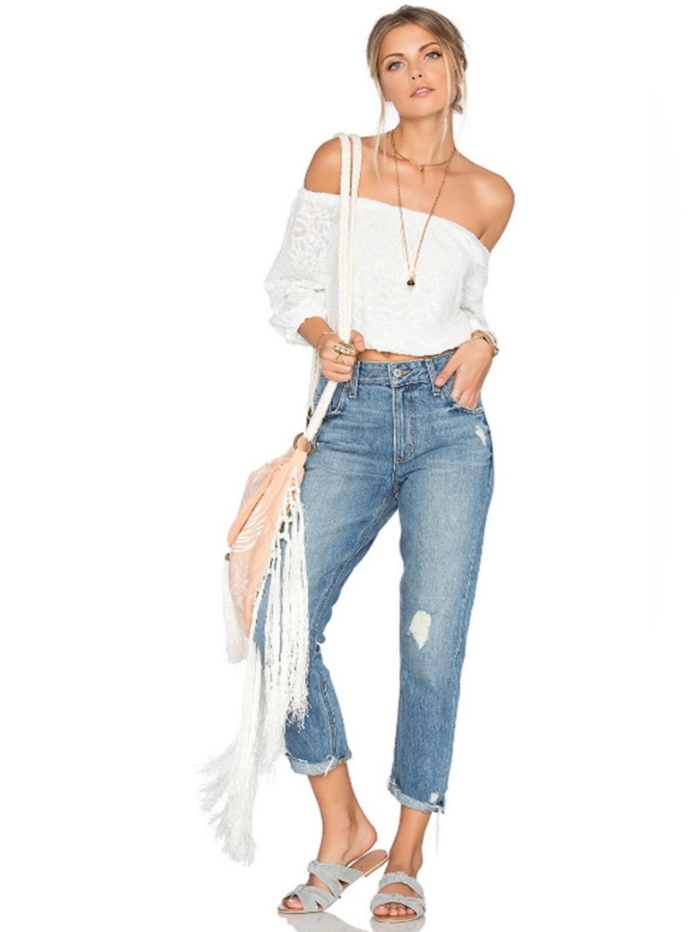 Tularosa off-shoulder top with eyelet lace embroidery and bell sleeves. Size S